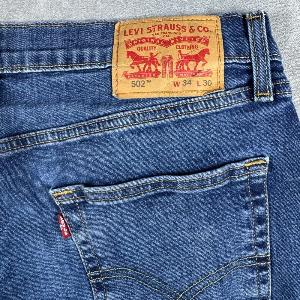 Levis 502 Regular Taper Mens Jeans 34x30 Blue Medium Wash Stretch Denim